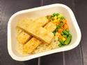 Tender multigrain breaded fish fillets on rice